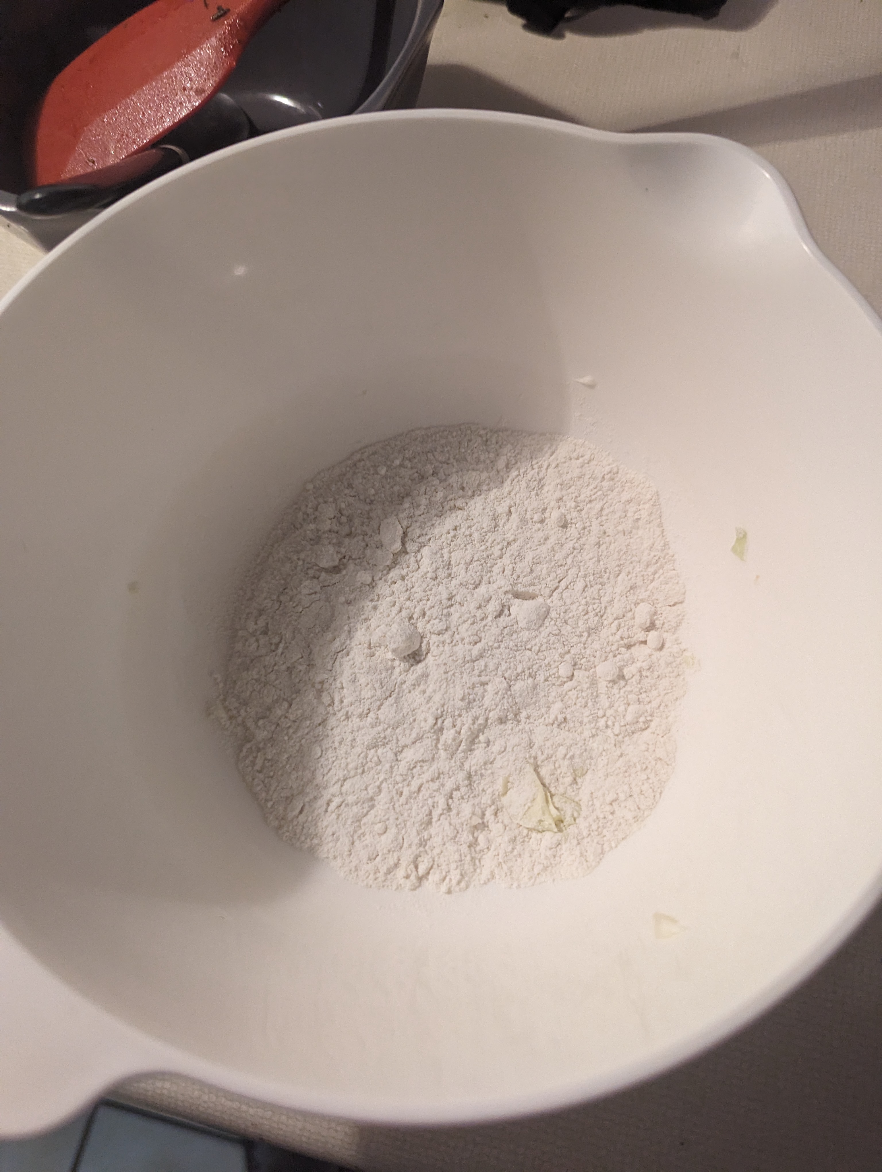 A couple of tablespoons of flour in a bowl