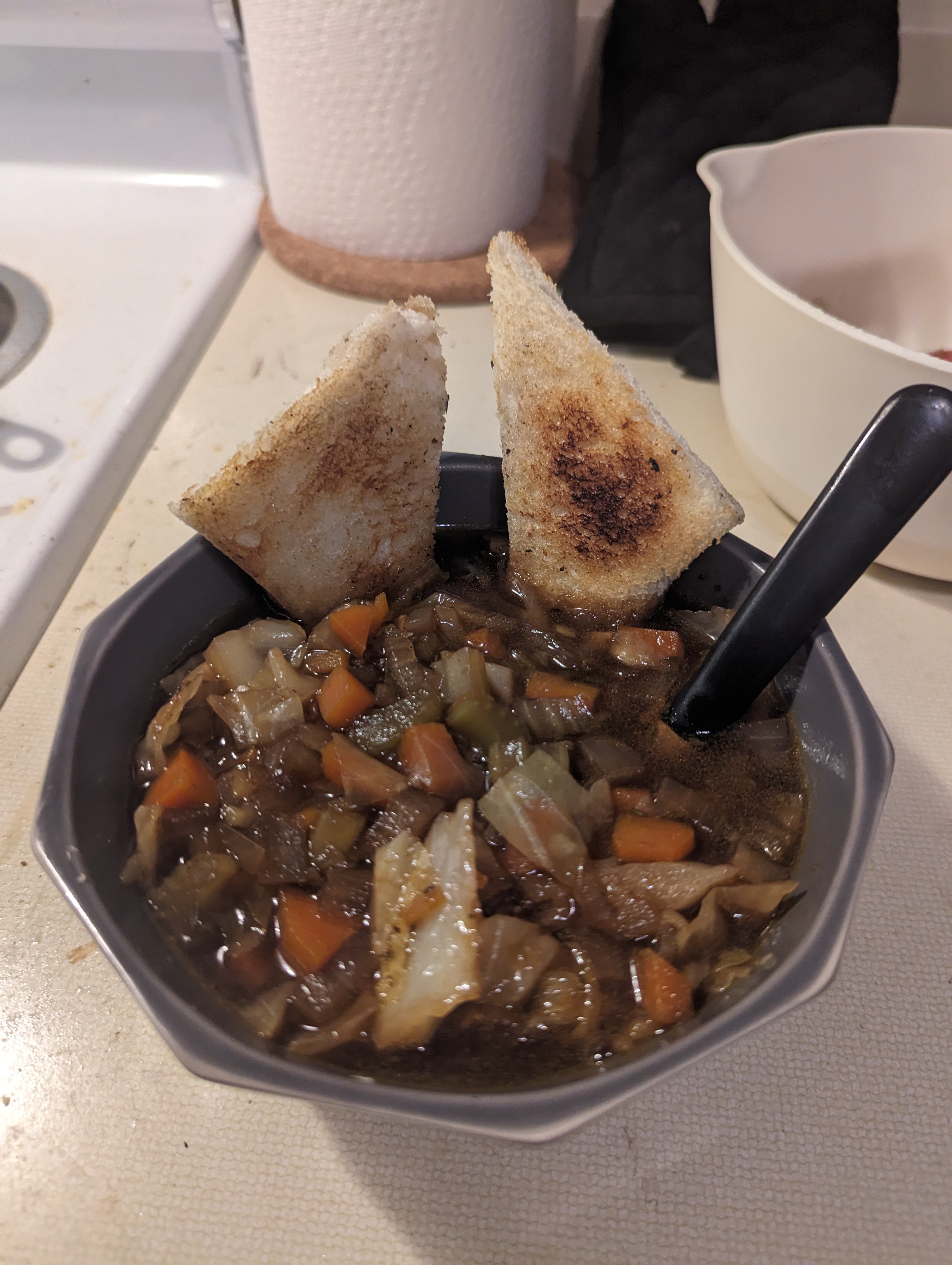 The completed stew, served with toast points